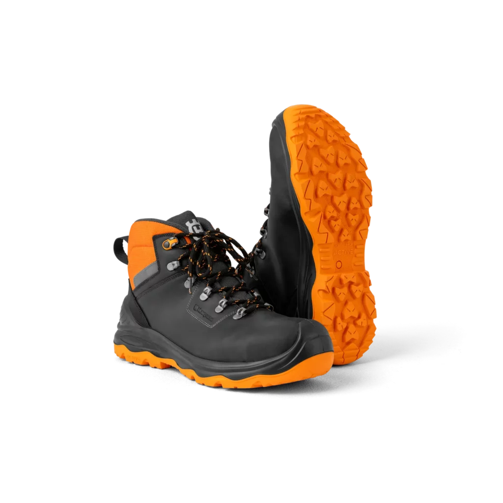 Brodequins Husqvarna Technical Light noirs et orange, semelle orange